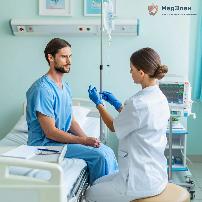 Врач ставит капельницу пациенту
